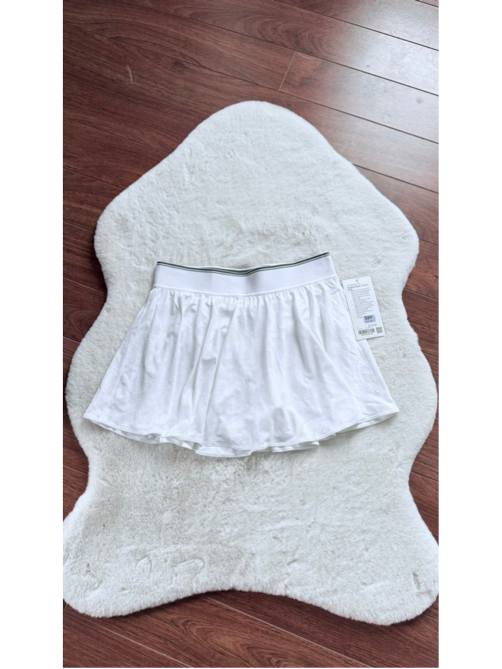 Size 10 paisley-mesh tennis skirt, 3.5" liner length, white, NWT